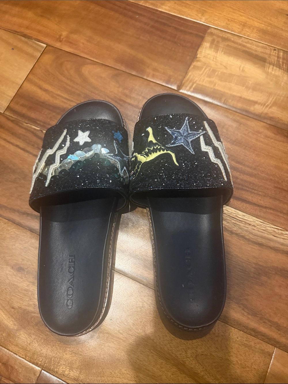 COACH Womens’ Black Glitter Slide Sandals with Star ⭐️ and Dinosaur 🦕 Detail